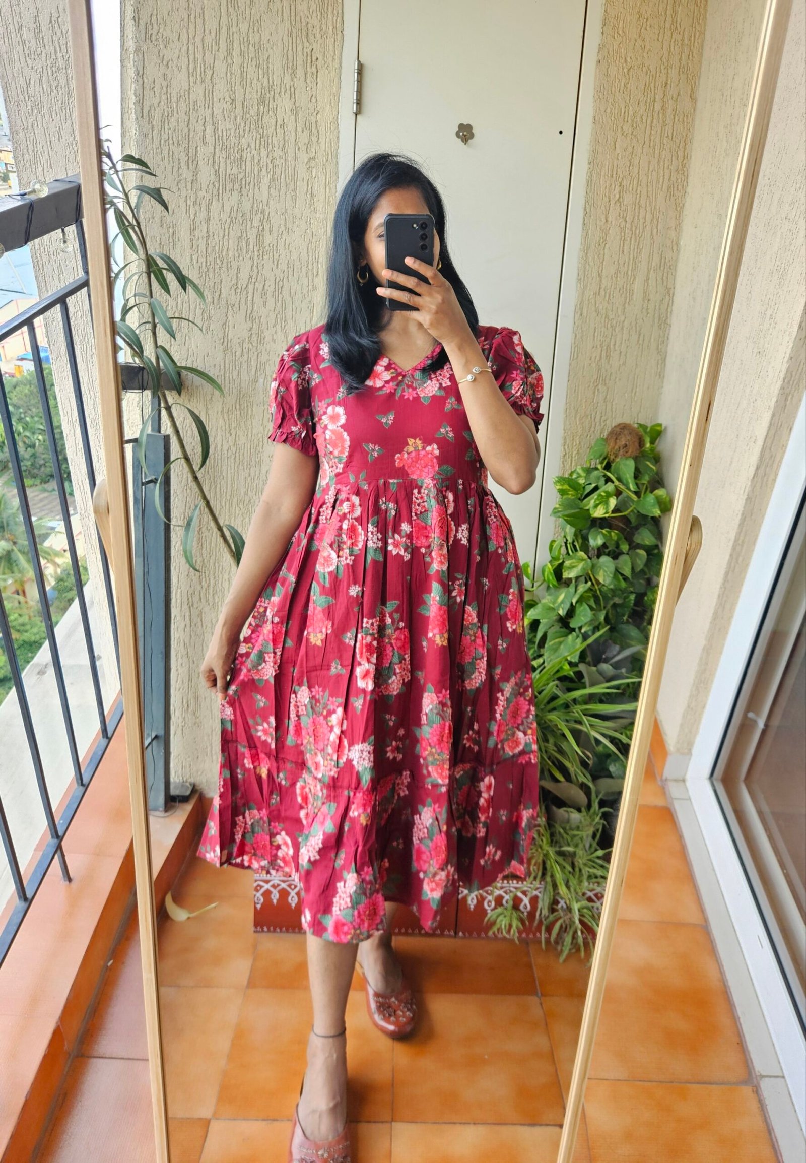 Maroon floral cotton frock.