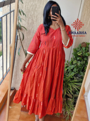 Orange Jamdhani dress.