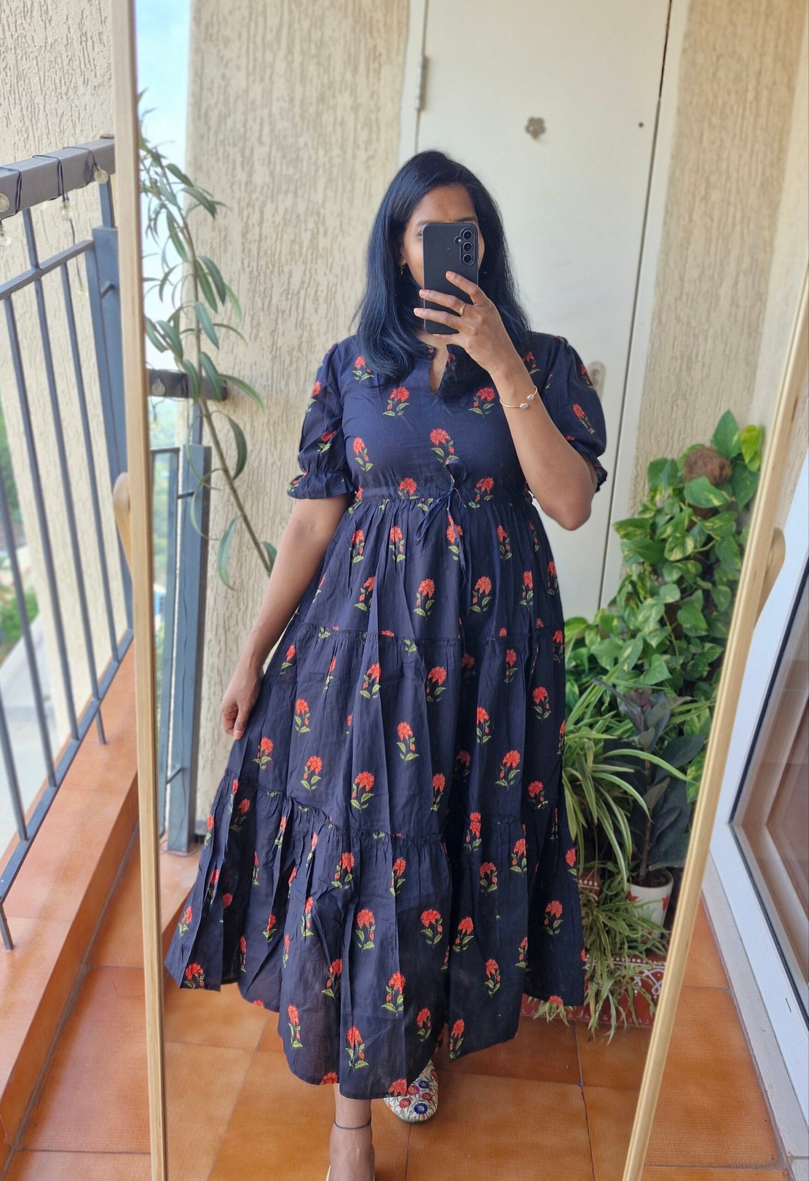 Black flower cotton three tier dress.