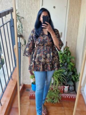 Black floral cotton ruffle top.