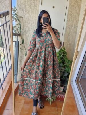 Green Kalamkaari kurti dress.