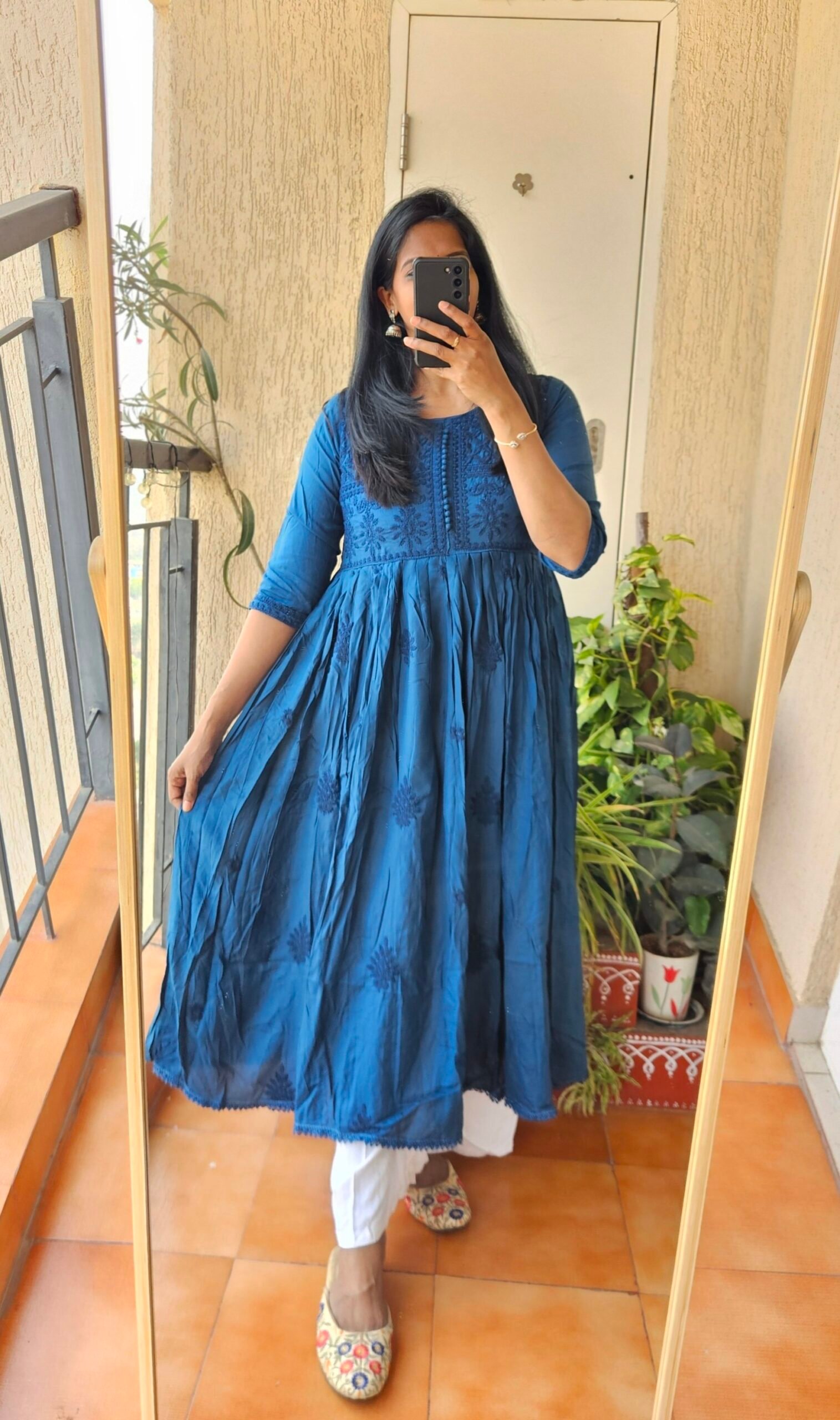 Teal blue solid Rayon chikankari dress.