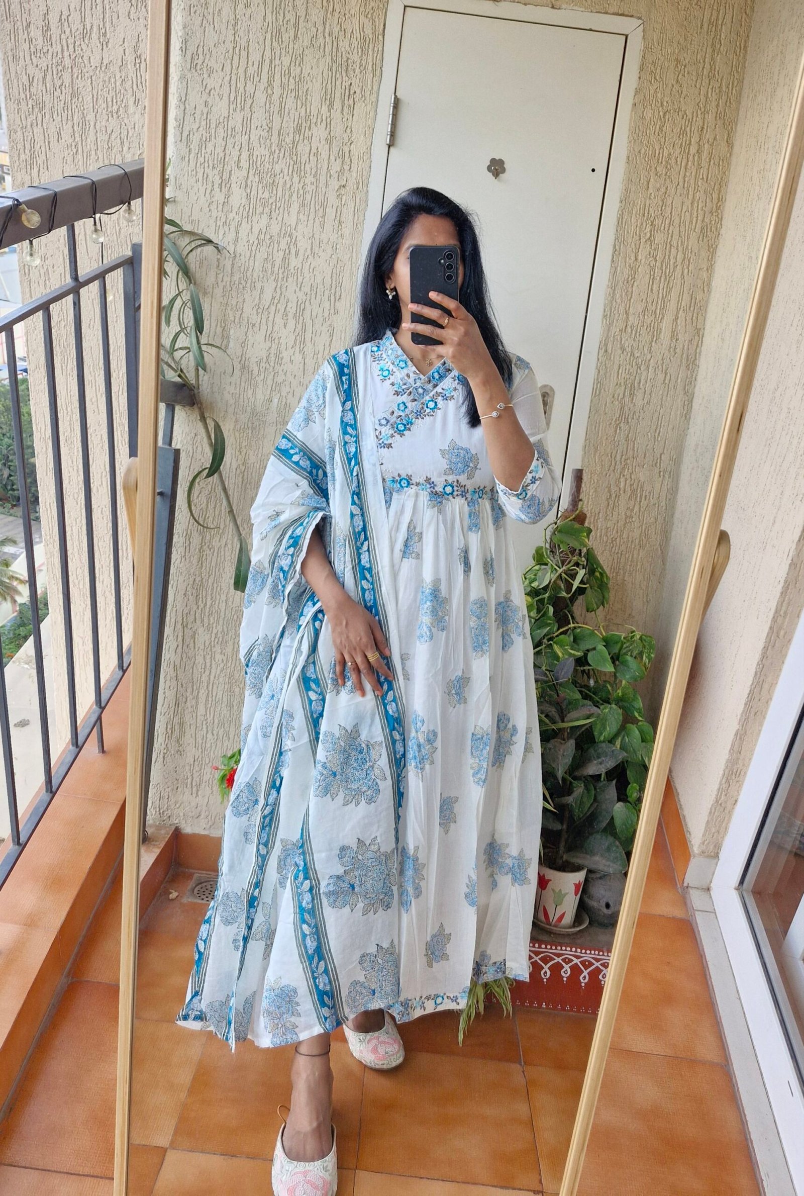 Blue floral mul cotton kurta set.