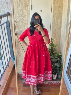 Red Jamdhaani cotton dress.