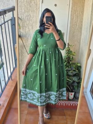 Green Jamdhaani cotton dress.
