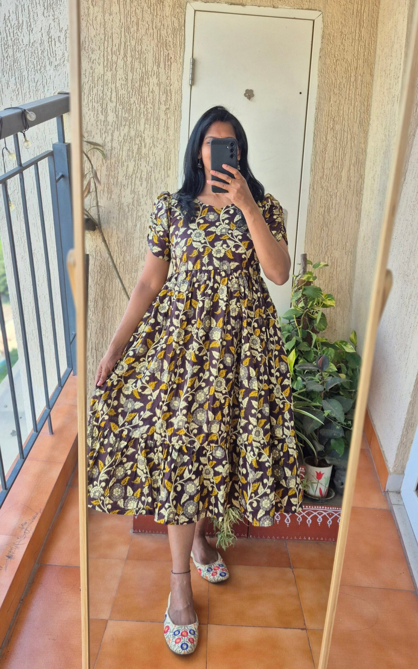 Brown Kalamkari print cotton dress.