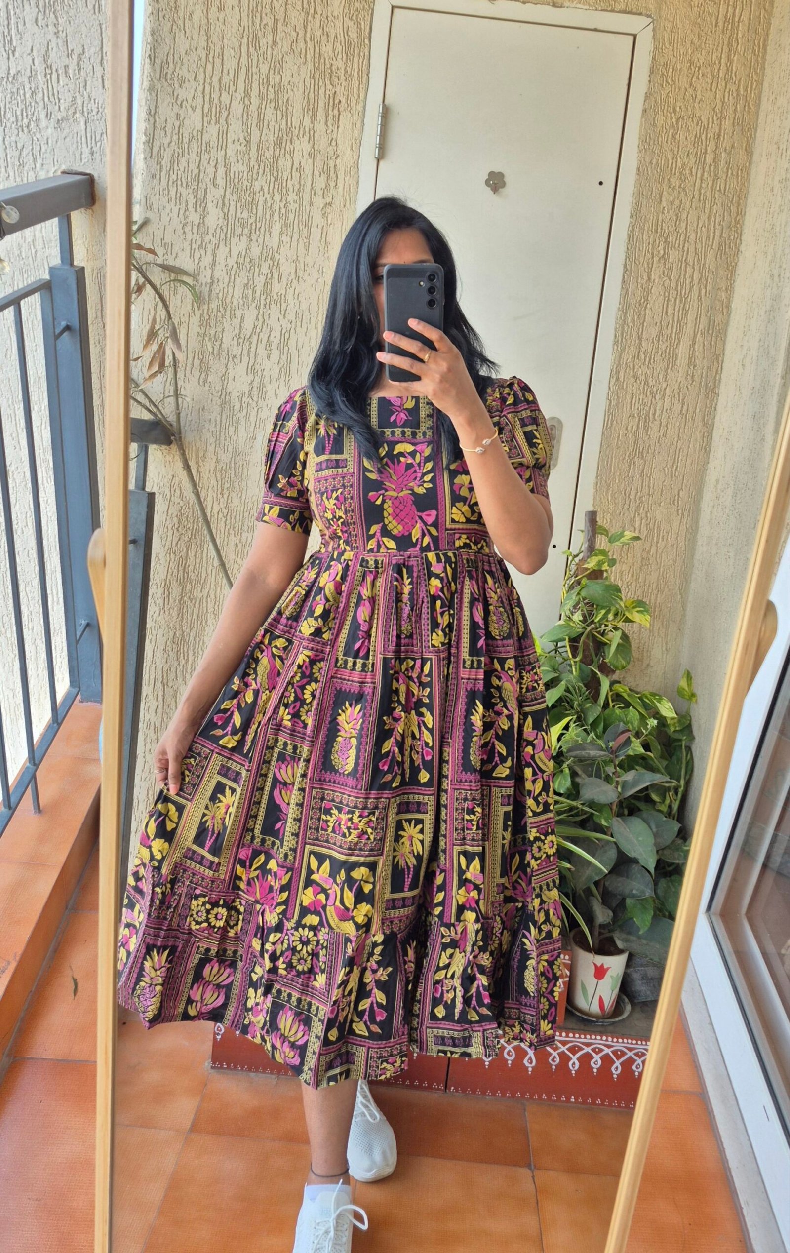 Black Macaw cotton dress.