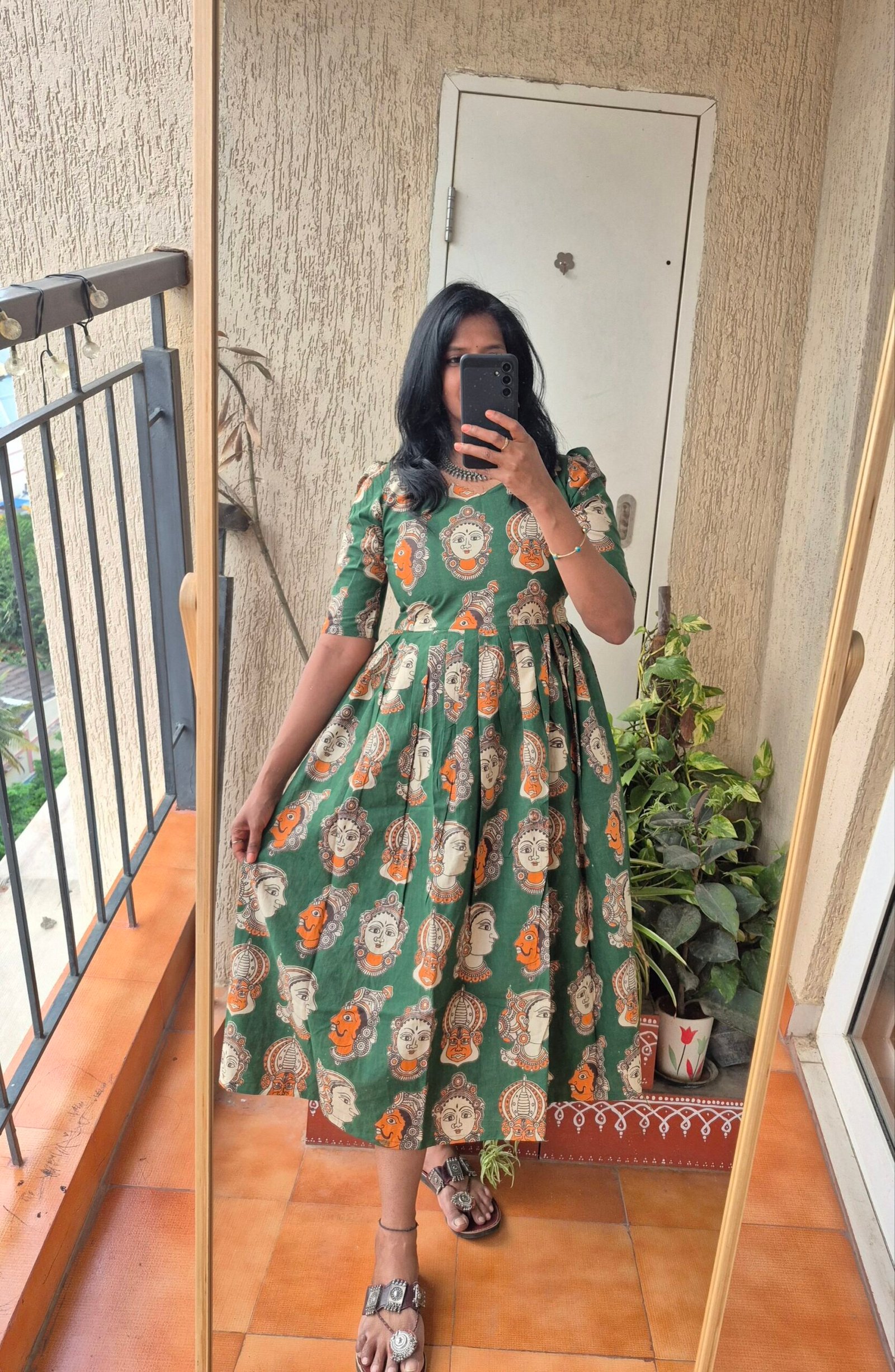 Green Kathakali cotton dress.