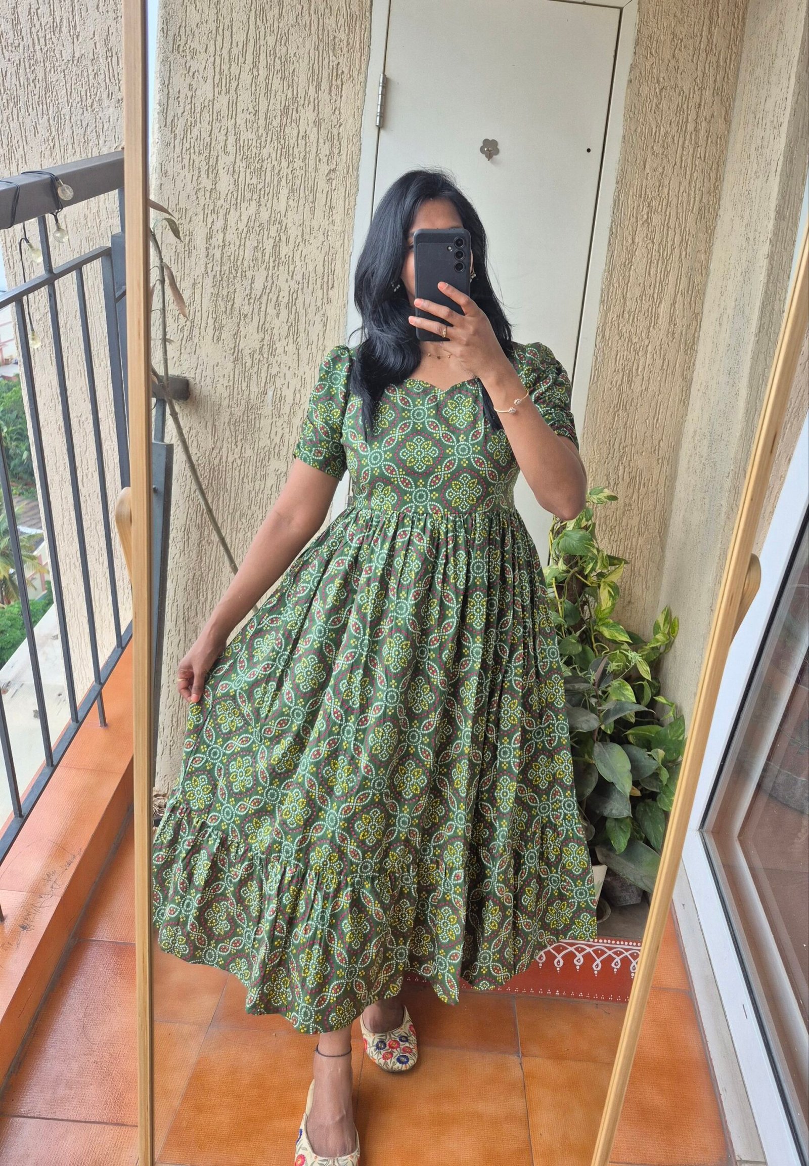 Green Bandhini cotton dress.