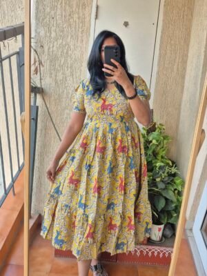 Yellow Jungle theme kalamkaari cotton dress.