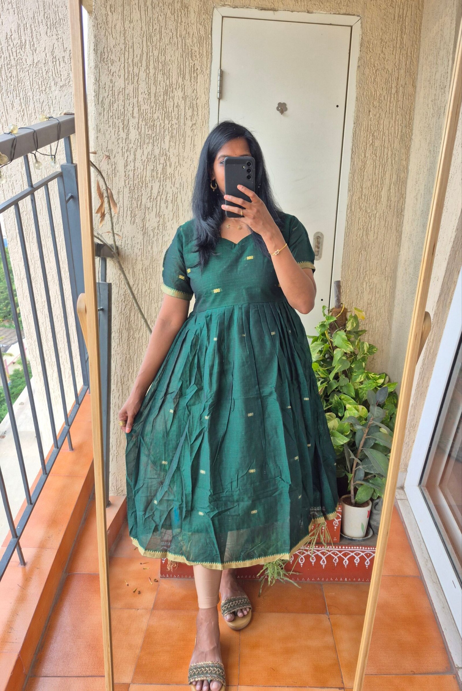 Bottle green Narayanpet cotton dress.