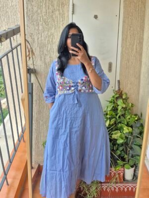 Powder blue jacket embroiderey dress.