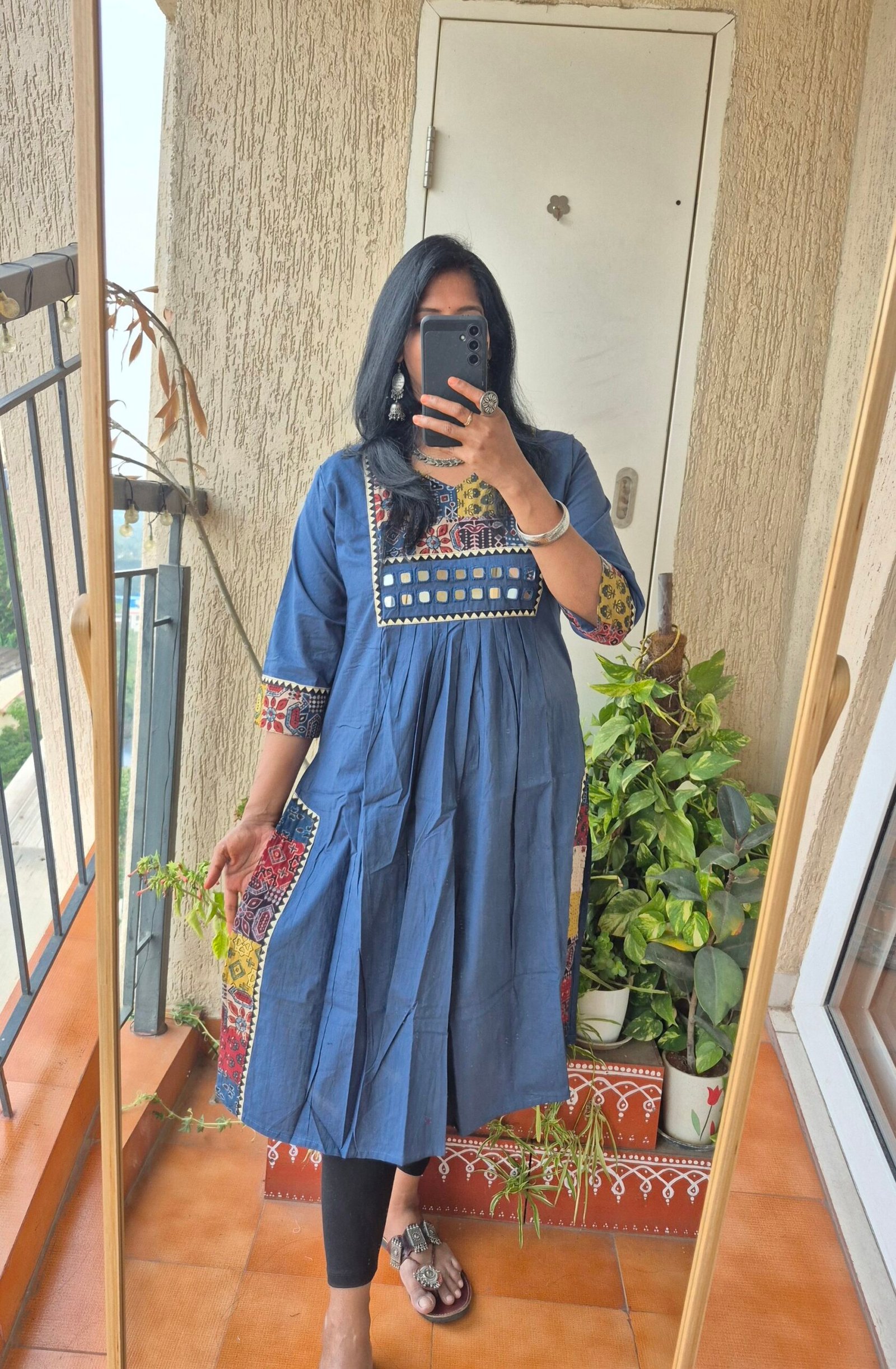 Blue ajrack patch work dress.