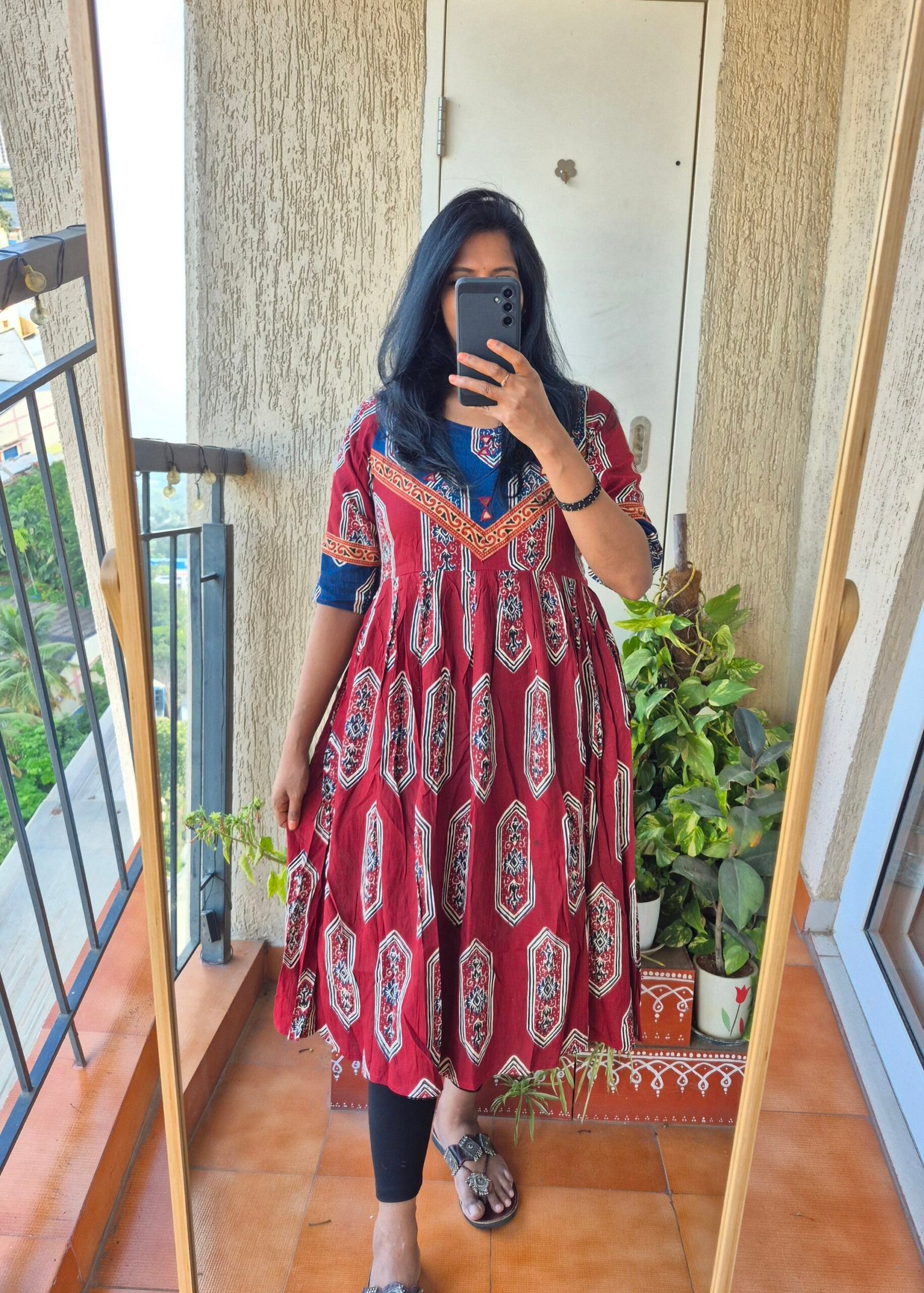 Marron Jarokha mirror work dress.